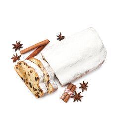 Traditional Christmas Stollen with icing sugar and spices isolated on white, top view