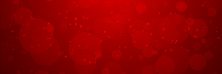 Abstract dark red background with glowing bokeh and sparkles