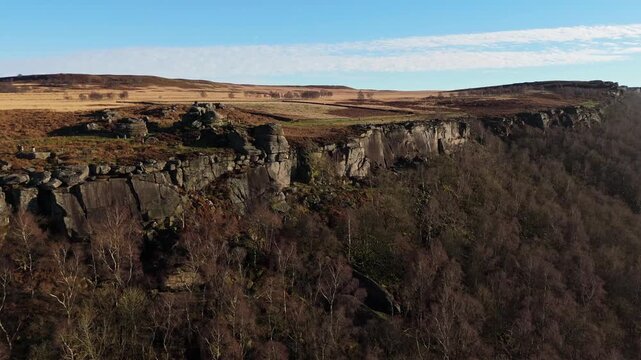 Scenic Cloud Inversion at the Peak District National park in the UK.  Cinematic Drone Landscape Exploration around Froggatt Edge, Curbar Edge and Baslow Edge, which are the most popular hiking trails.