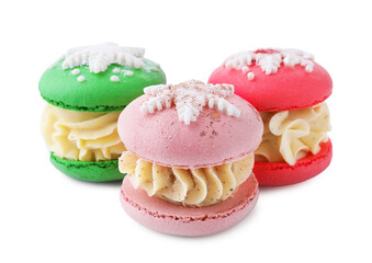 Festively decorated macarons isolated on white. Christmas treat