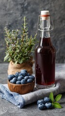 Homemade Blueberry Beverage in Glass Bottle