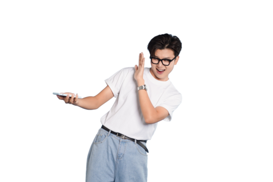 Smartphone User's Delight: A young man, engrossed in his smartphone, exhibits a mix of surprise and delight, captured in a candid moment. 