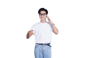 Friendly Conversation: A young individual smiles warmly as they engage in a phone conversation, pointing down while communicating a thoughtful and positive message.
