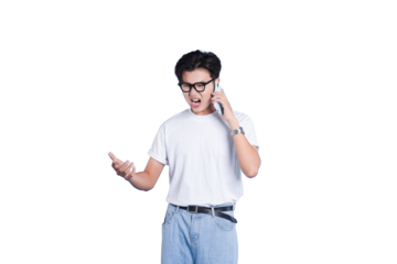 Frustrated Phone Call: A young man is captured in a moment of frustration, his expression a mix of annoyance as he holds a phone to his ear.