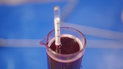 Watch the wine making test tube machine thermometer in action today