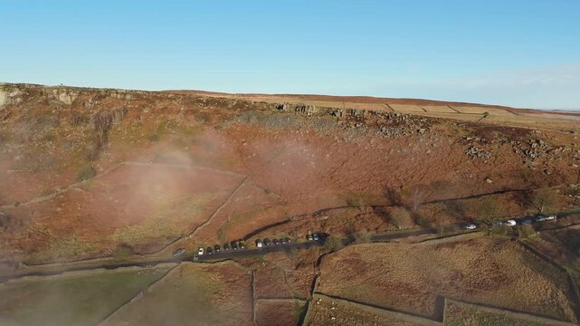 Scenic Cloud Inversion at the Peak District National park in the UK.  Cinematic Drone Landscape Exploration around Froggatt Edge, Curbar Edge and Baslow Edge, which are the most popular hiking trails.
