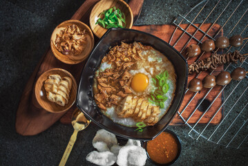 chicken congee with various condiments