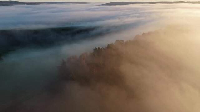 Scenic Cloud Inversion at the Peak District National park in the UK.  Cinematic Drone Landscape Exploration around Froggatt Edge, Curbar Edge and Baslow Edge, which are the most popular hiking trails.