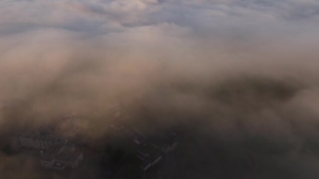 Scenic Cloud Inversion at the Peak District National park in the UK.  Cinematic Drone Landscape Exploration around Froggatt Edge, Curbar Edge and Baslow Edge, which are the most popular hiking trails.