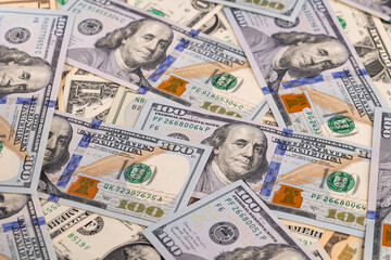 Full Frame Scattered US One Hundred Dollar Banknotes Background