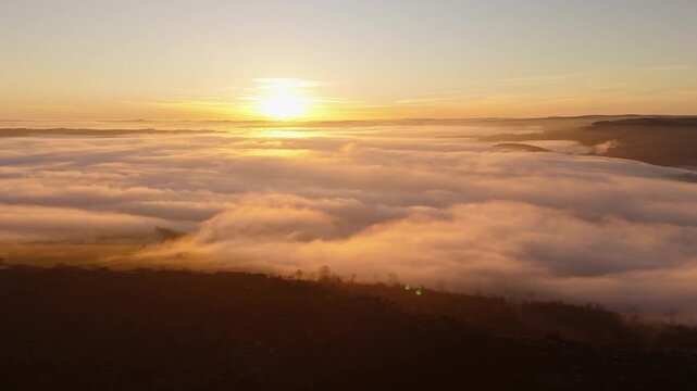Scenic Cloud Inversion at the Peak District National park in the UK.  Cinematic Drone Landscape Exploration around Froggatt Edge, Curbar Edge and Baslow Edge, which are the most popular hiking trails.
