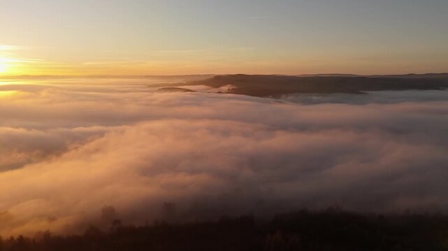 Scenic Cloud Inversion at the Peak District National park in the UK.  Cinematic Drone Landscape Exploration around Froggatt Edge, Curbar Edge and Baslow Edge, which are the most popular hiking trails.