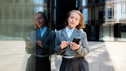 Pro using smartphone outdoors