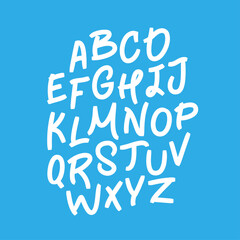 Capital letters of the Latin alphabet written in white marker on a blue background. Vector alphabet. Fashionable font. Lettering