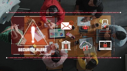 A dramatic security alert displayed in a modern office environment highlights teamwork and technology. Professionals engage in collaboration and strategy development. Raster