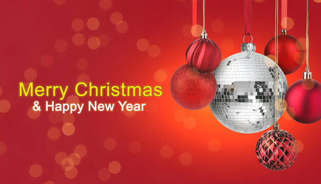 Merry Christmas and Happy New Year card. Shiny disco ball and festive ornaments on red background with bokeh lights. Banner design