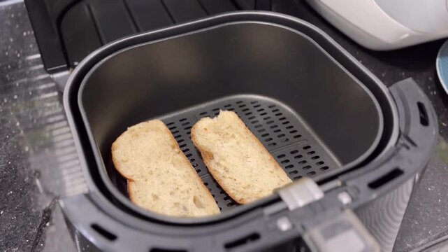 In the oven, sourdough bread bakes to a beautiful crispy crust. Opening the oven after baking, 