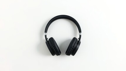 Sleek black audio headset for listening to music or podcasts, isolated on a stark white background with copy space