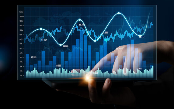 A hand features interaction with a tablet displaying colorful financial charts and graphs, highlighting data trends in a dark ambiance for business insights. Scalp - Powered by Adobe