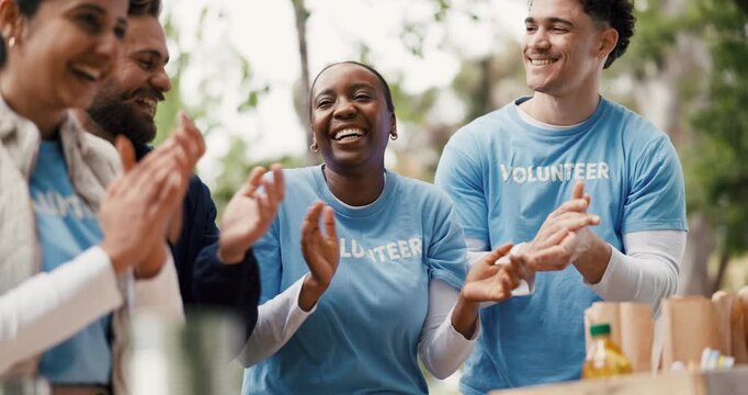 Volunteer, team or people outdoor with clap, collaboration or milestone reach in community service project. Happy, group or NGO in park with applause, motivation or outreach goal in charity campaign.