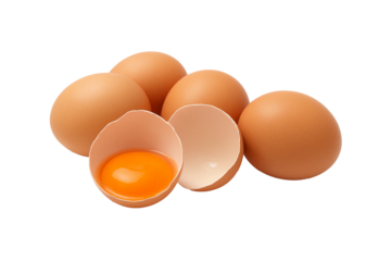 Orange and yellow egg yolks side by side in their respective shells