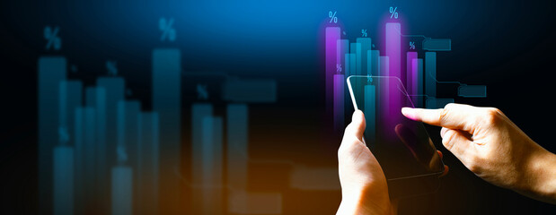 hand of businessman interactive touching a holographic financial growth graph chart system network and technology, success of trading innovation