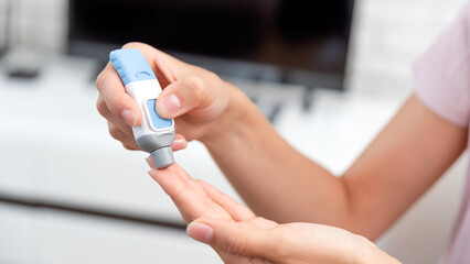 Diabetes doing blood glucose measurement.