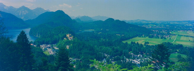 Aerial Panorama of Hohenschwangau Castle Overlooking Alpine Valley and Forggensee, Bavaria, Germany during 2000s