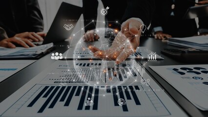 Dynamic business team engaged in data analysis and strategic planning. Digital graphics enhance collaboration, highlighting growth opportunities and insights. Raster