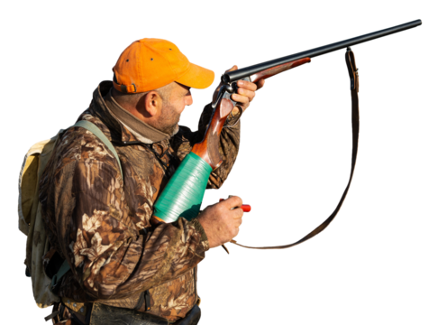 Midsection of man unloading shotgun while standing on field