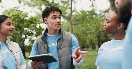 Charity, meeting and tablet with volunteer group outdoor for community service direction. Activism, app and collaboration with man speaking to outreach team in park for ngo or non profit organization - Powered by Adobe