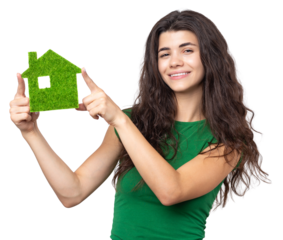 Happy house buyer. A young girl holds a model of a green house in her hands. The concept of green energy, ecology.