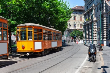 Gordijnen Milaan Old street with vintage tram in Milan, Italy. Architecture and landmarks of Milan. Cozy cityscape of Milan.  © Ekaterina Belova