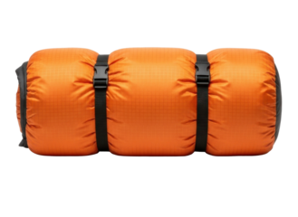 Rolled-up orange sleeping bag with black straps and buckles, ready for travel and camping.