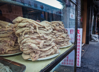 Pieces of meat coated in breadcrumbs in Shanghai city, China