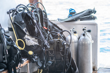 Dive Equipment Preparation on a Boat in Tropical Waters During a Sunny Morning