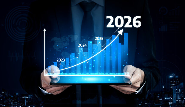 A businessman holds a tablet displaying a rising graph with projections for 2023 to 2026, symbolizing business growth and data analysis in a modern urban environment. Tessel