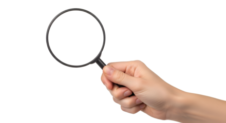 Hand Holding Magnifying Glass Against Black Background