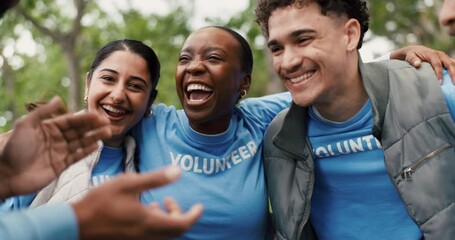 Volunteer, team or hug in park for community service, positive impact or conservation success. Applause, green project or people celebrate with fist bump for trash pick up, laugh or nature protection