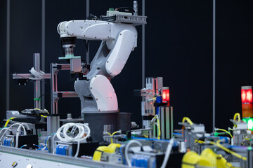 Robotic arm handling boxes on pallets in automated warehouse, Logistics warehouse automation robotics, Robotic arm automated factory packing system efficient industrial box handling and logistics