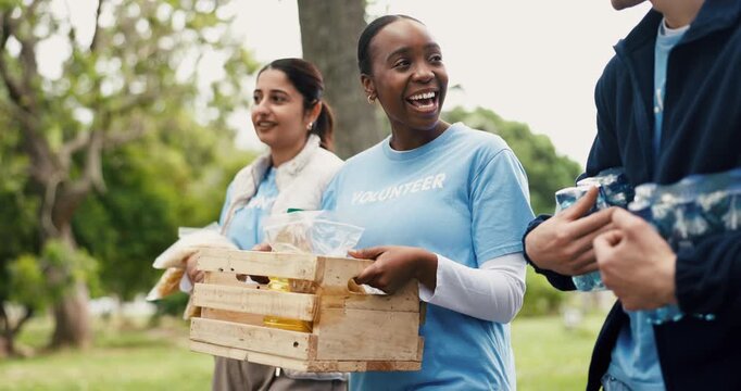 Happy people, food donation or volunteer team at park for walk, hunger relief or laugh. Charity, funny or outdoor with groceries for NGO, community service or distribution to help for poverty support