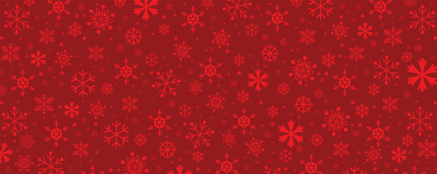 A seamless, festive pattern background composed of various sizes and styles of monochromatic red snowflakes on a deep red backdrop. This repeating texture is ideal for Christmas, winter, and holiday-t