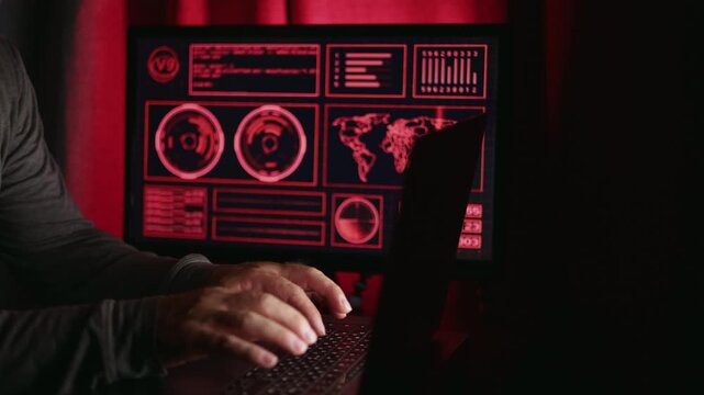 Covert workstation with focused keyboard inputs, Encrypted environment showing secret data access in progress, Unauthorized surveillance setup with intense keyboard activity in concealed room concept