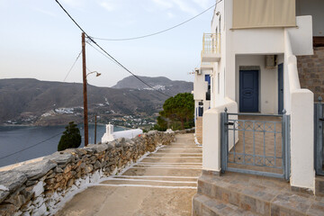 Potamos village overlooking Aegiali village and Aegean Sea. Amorgos, Cyclades, Greece