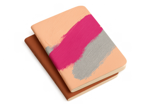 Stacked notebooks with hand painted covers, art supplies representing creativity, ideas, and journaling on transparent background