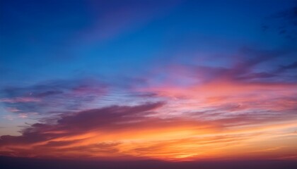 Obraz premium Beautiful Sunset Sky With Gradients Of Orange Pink And Blue