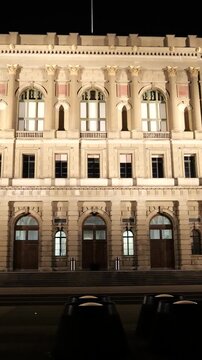nighttime illuminated eth zurich university building scene learning academic excellence switzerland panning view atmosphere environment 