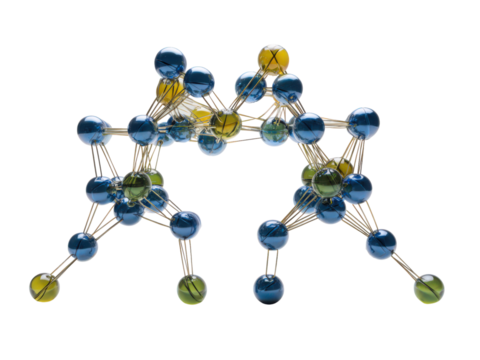 A blue and green ball structure with a yellow ball in the middle