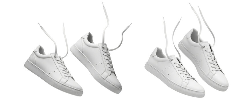 Set of white leather sneakers with untied shoelaces floating in the air isolated on white