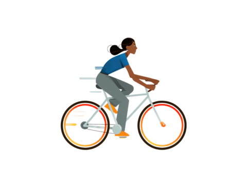 A woman is riding a bicycle
